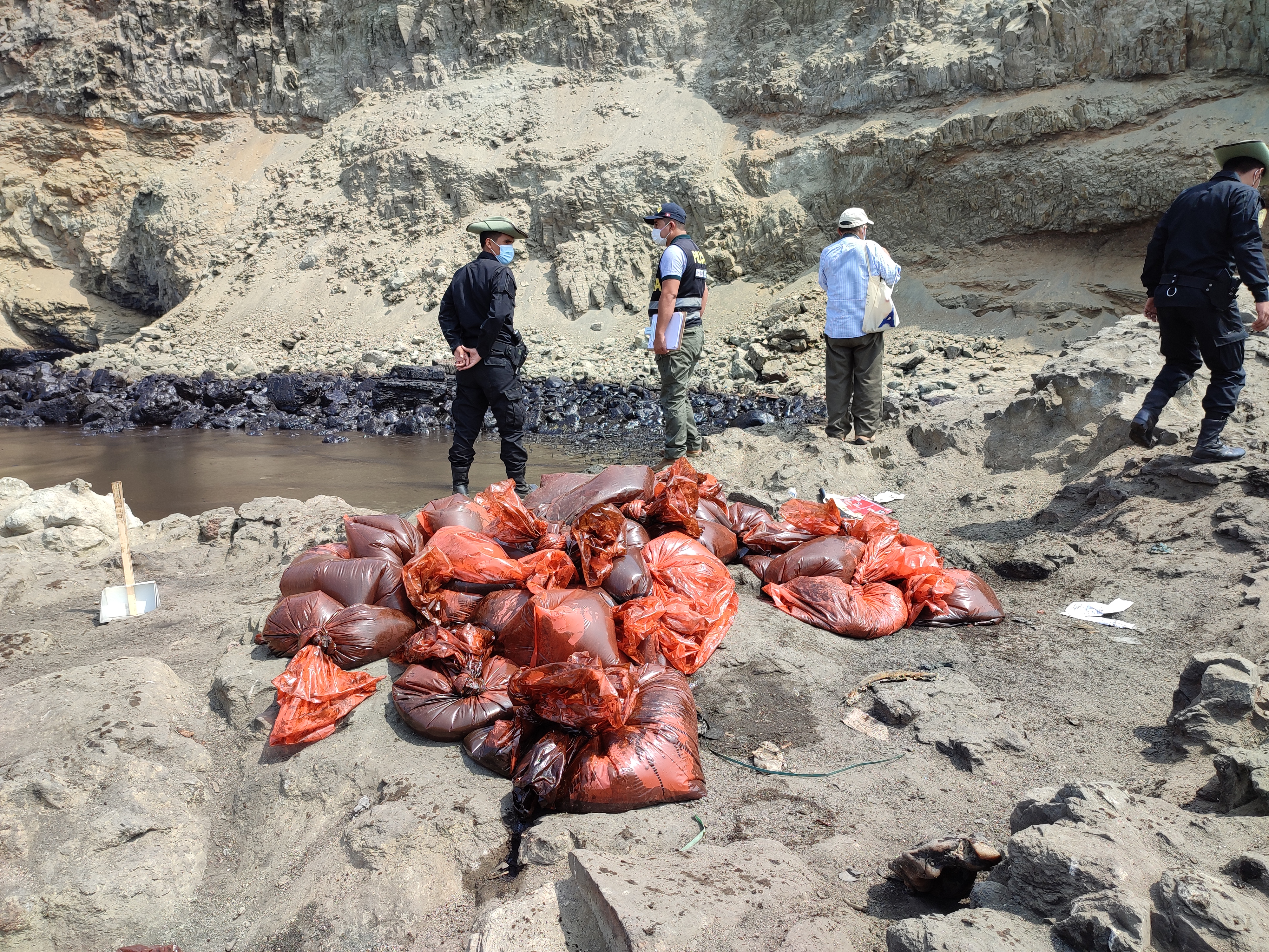Bags of crude oil in Ventanilla, Peru