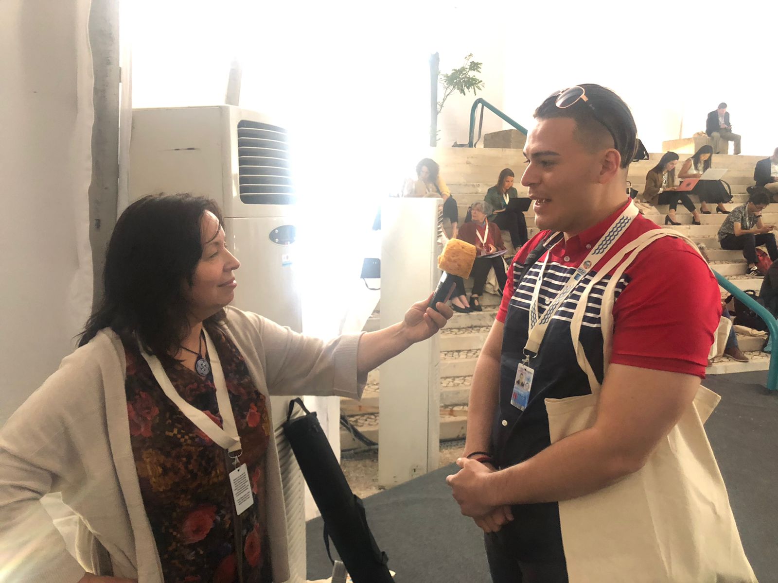 Aaron Chacon being interviewed at UNOC 2022