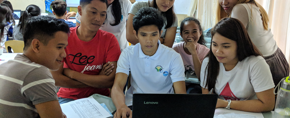 Working together and looking at a computer screen